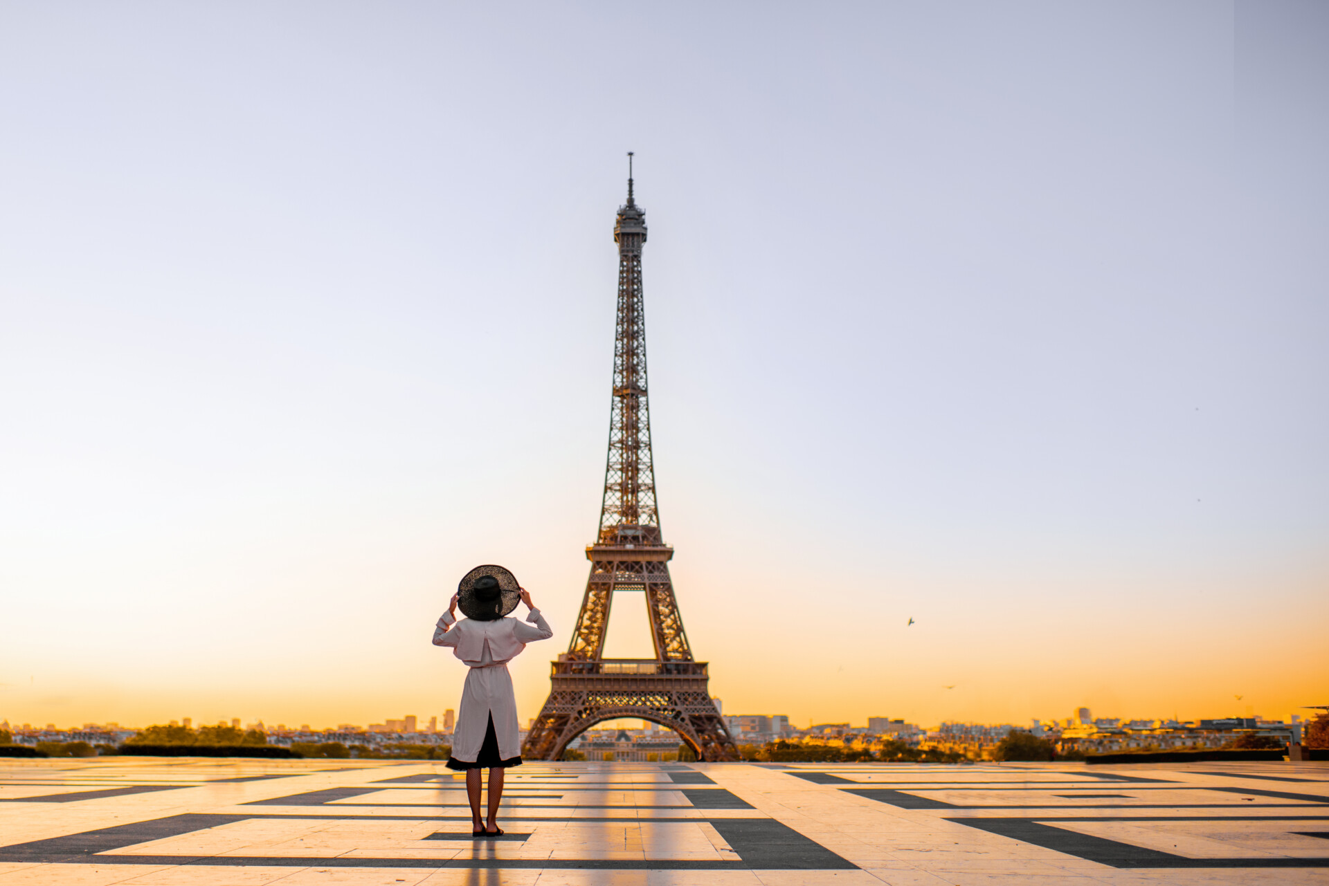 woman-on-the-square-with-beautiful-view-on-the-eif-2025-03-13-03-12-15-utc