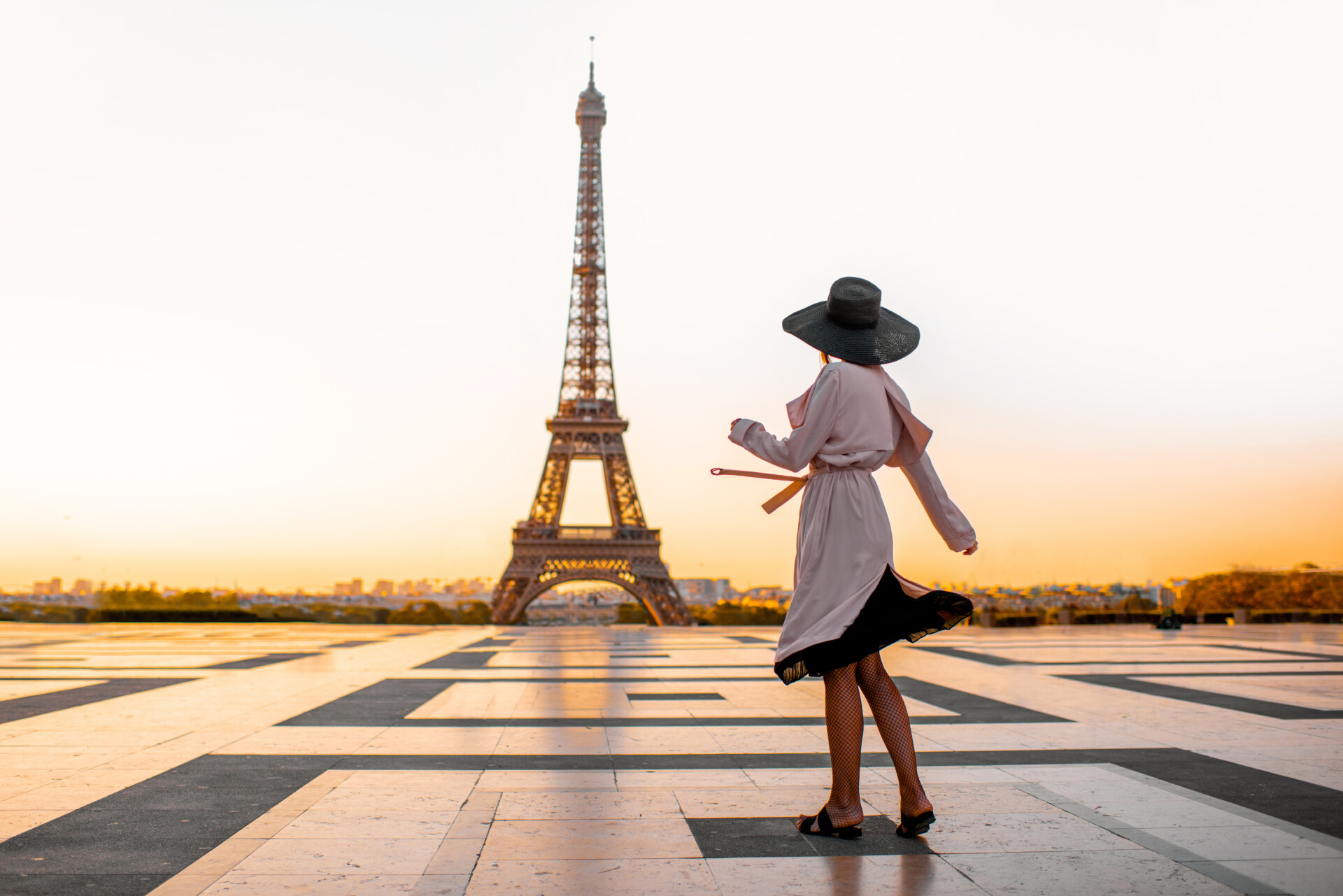 woman-on-the-square-with-beautiful-view-on-the-eif-2025-03-13-03-12-25-utc